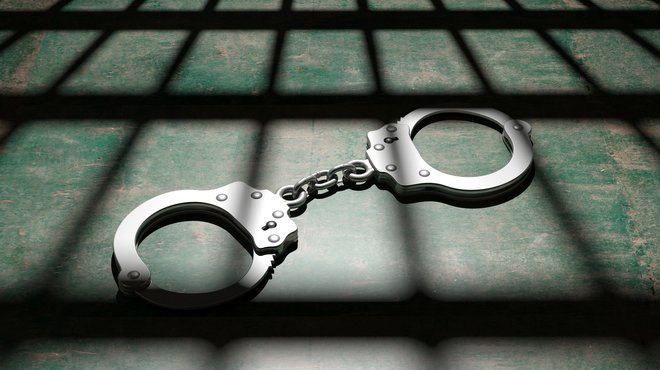 Jail bars and handcuffs generic