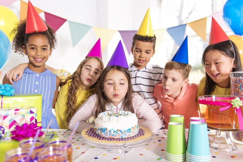 Group of children at birthday party at home