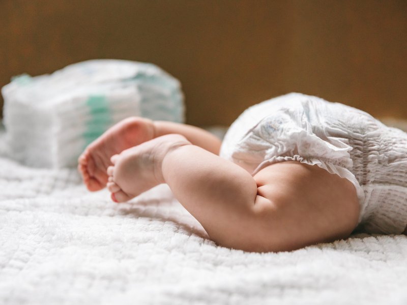Flight passenger shocked by mother changing baby diaper on eating tray