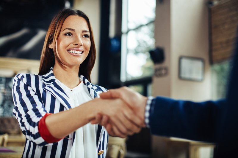 Businesswoman workplace handshake confidence