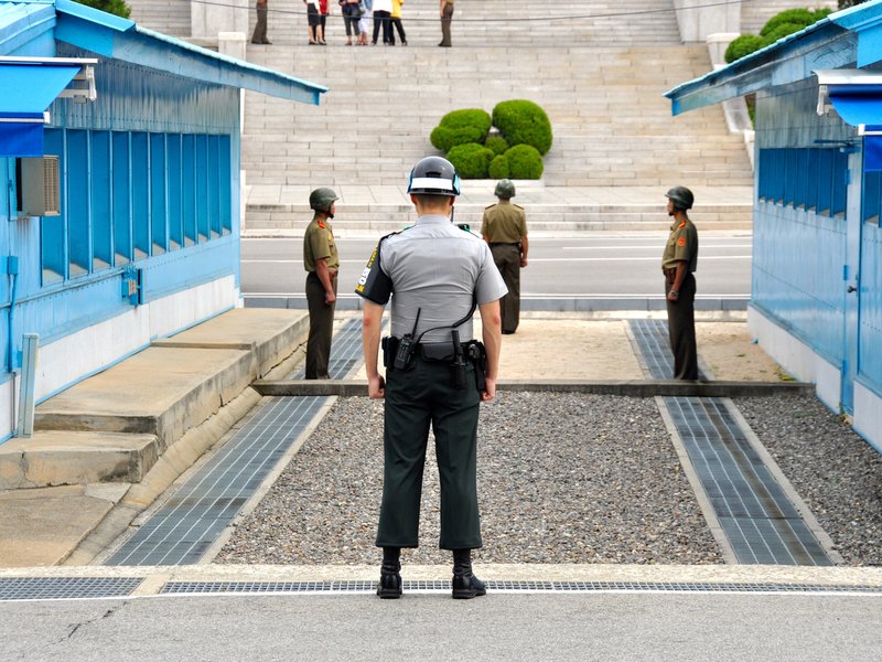 Korean soldiers watching border between South and North Korea in the Joint Security Area (DMZ) on September 26, 2014 in Panmunjom, South Korea.