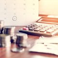 Budgeting with a calculator / iStock