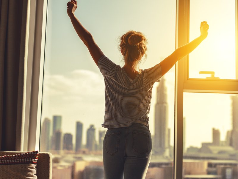 Woman waking up in the morning
