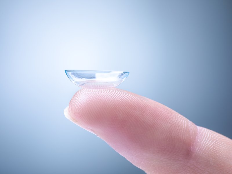 Contact Lens on a Finger / iStock