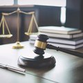 Gavel on wooden table / iStock