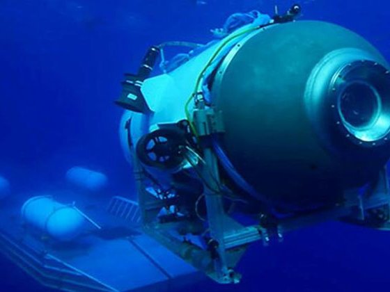 Rescuers embark on all-night race to save Titanic sub crew