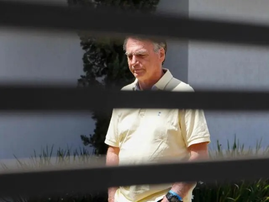 Brazil's Bolsonaro begins 27-year jail term for coup bid