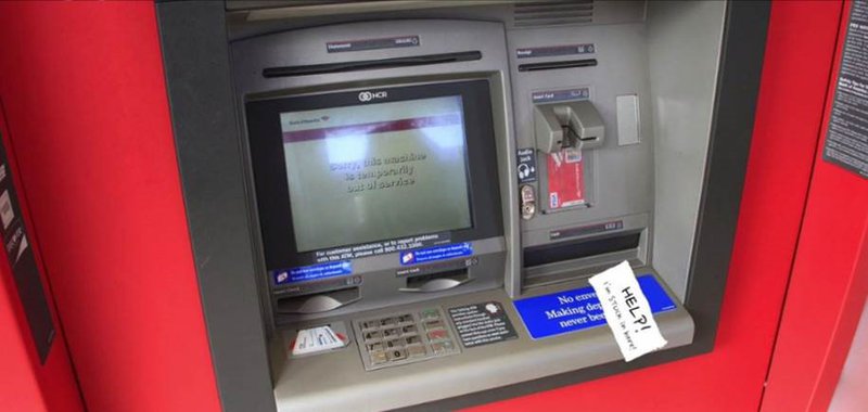 man trapped in an atm image funny