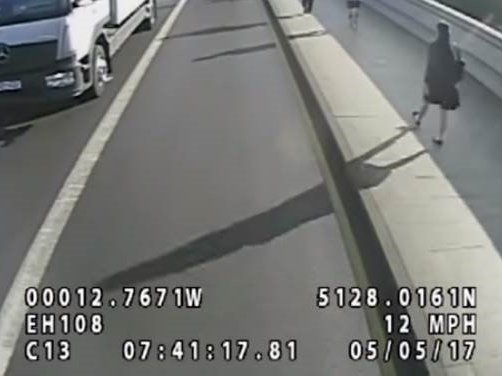 image man pushes woman in front of bus