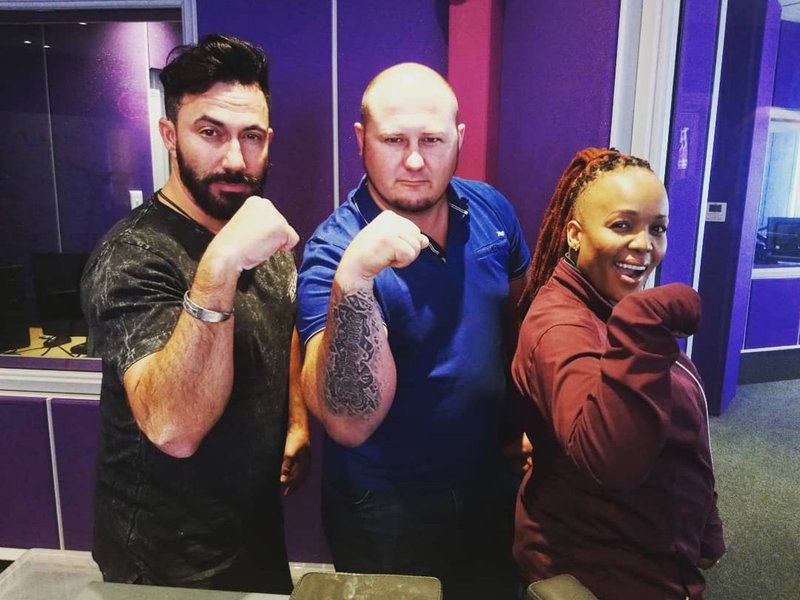 image martin and tumi arm wrestling