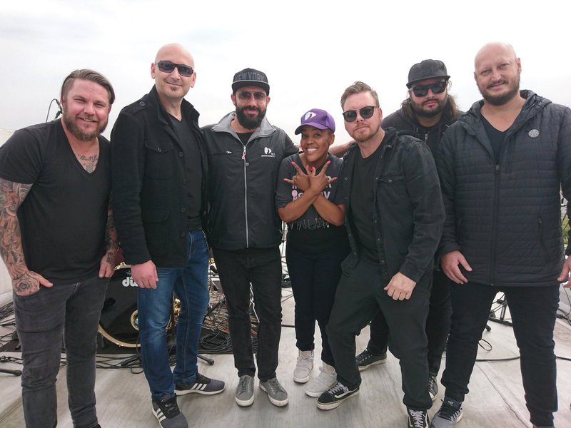 image martin and tumi with band on roof