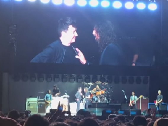 image rick astley and foo fighters on stage