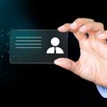 Hand holding digital identification card