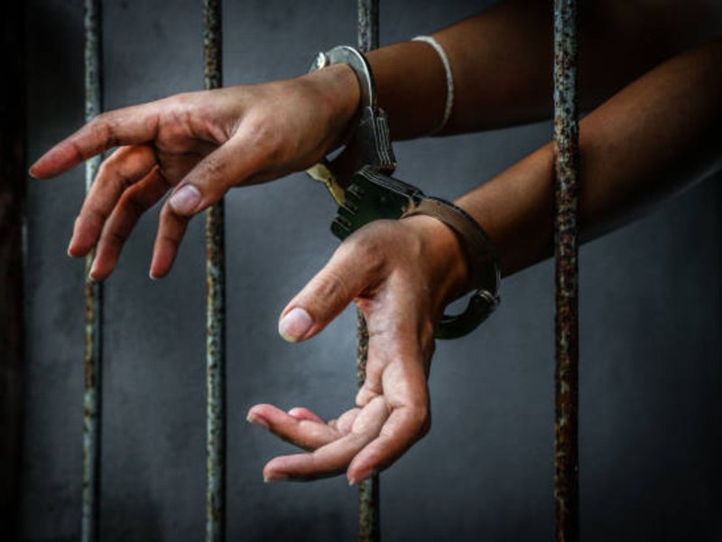 Woman in handcuffs