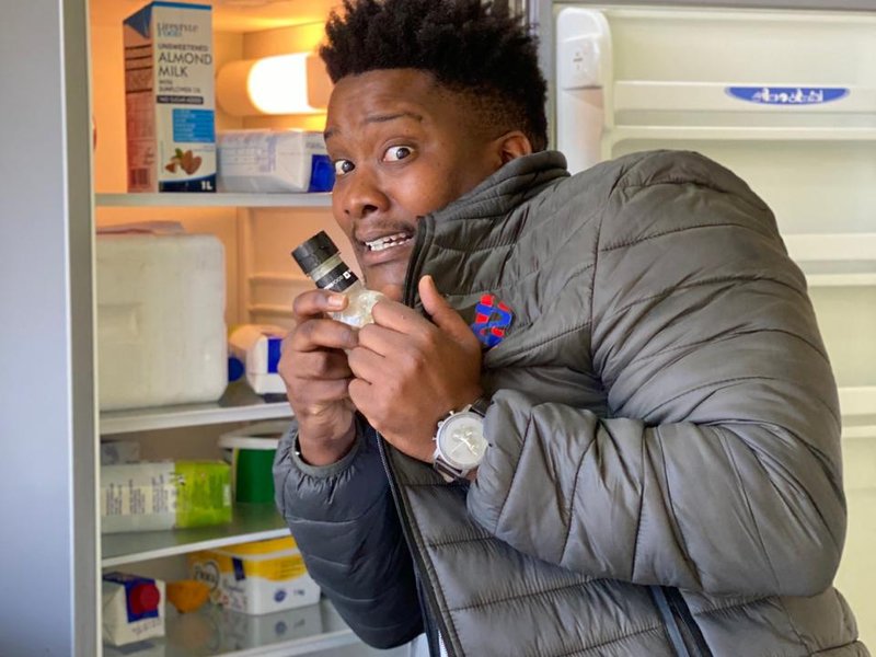 JSbu in Stacey's fridge taking some salad dressing home