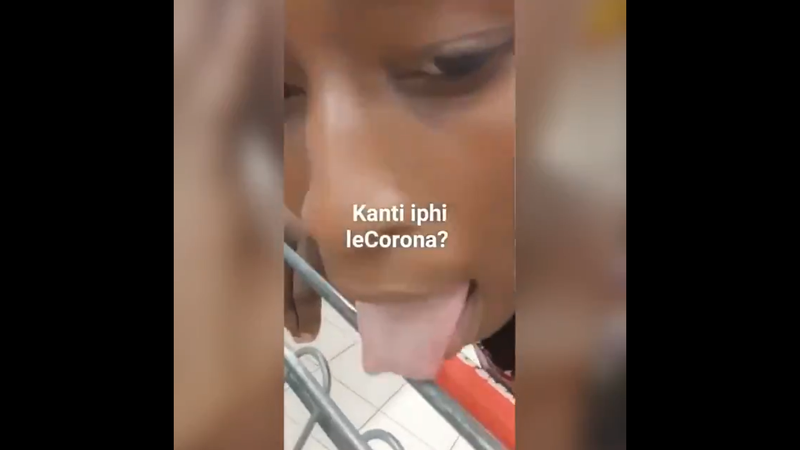 lady licking a trolley handle