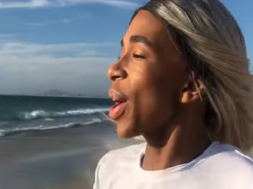 lasizwe dambuza on the beach