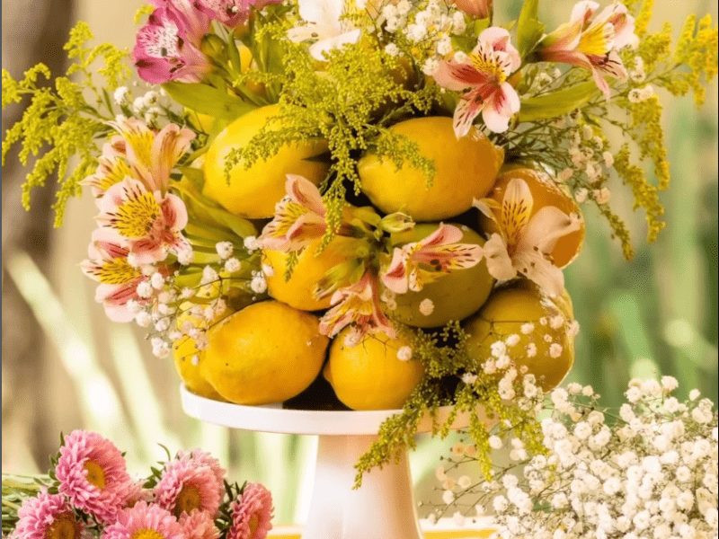 Table centrepiece decorated with lemons and baby's breath
