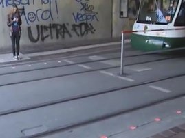 Australia to trial ground-level traffic lights for smartphone users_video