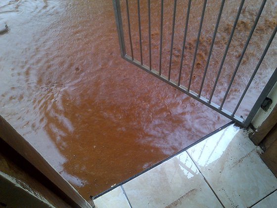 Flooded garden, home in Isipingo