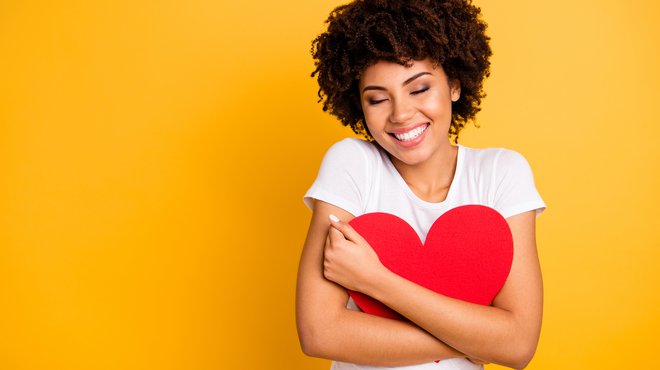 Woman holding heart