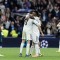 Real Madrid player Vinicius Junior celebrates in Champions League