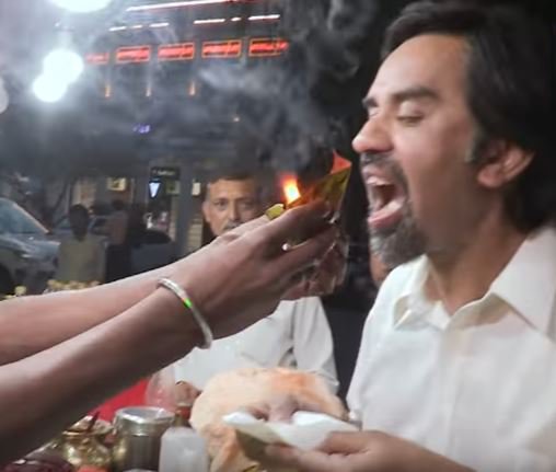 Man eating paan