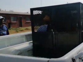 Free State man in dog cage