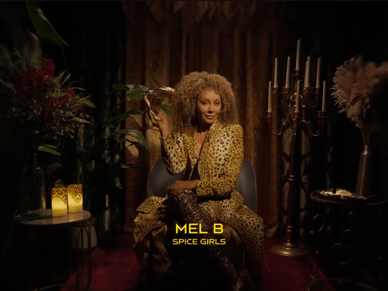 Spice Girls star Mel B holding a mask