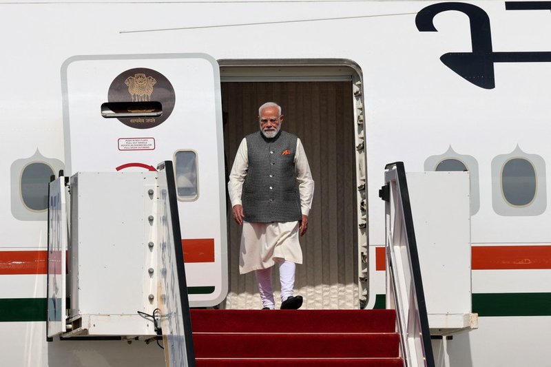 India Prime Minister Narendra Modi steps off his official plane