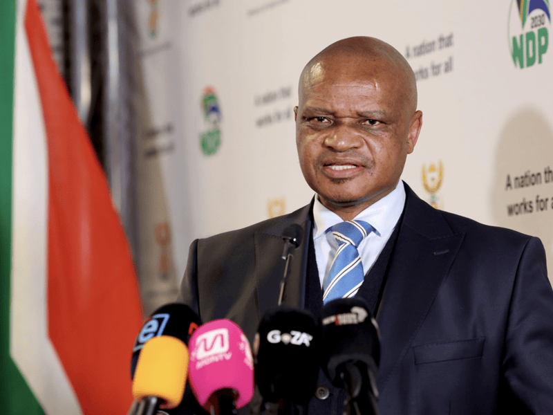 National Director of Public Prosecutions Andy Mothibi briefing media in July 2026
