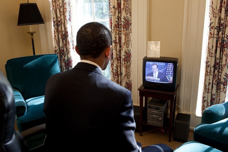 Obama watching tv