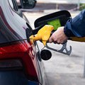Motorist fuels up car in France March 2026