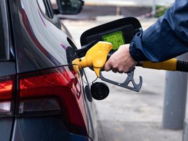 Motorist fuels up car in France March 2026