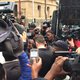 Oscar Pistorius surrounded by TRT outside court_jacanews