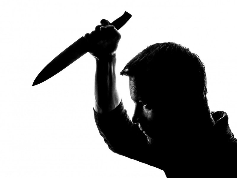 man wielding knife