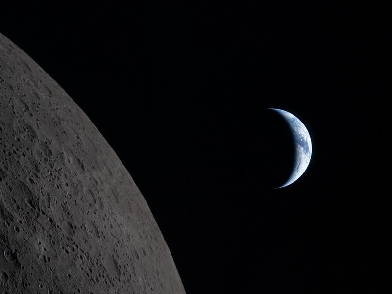 Earth drawing closer to passing behind the Moon