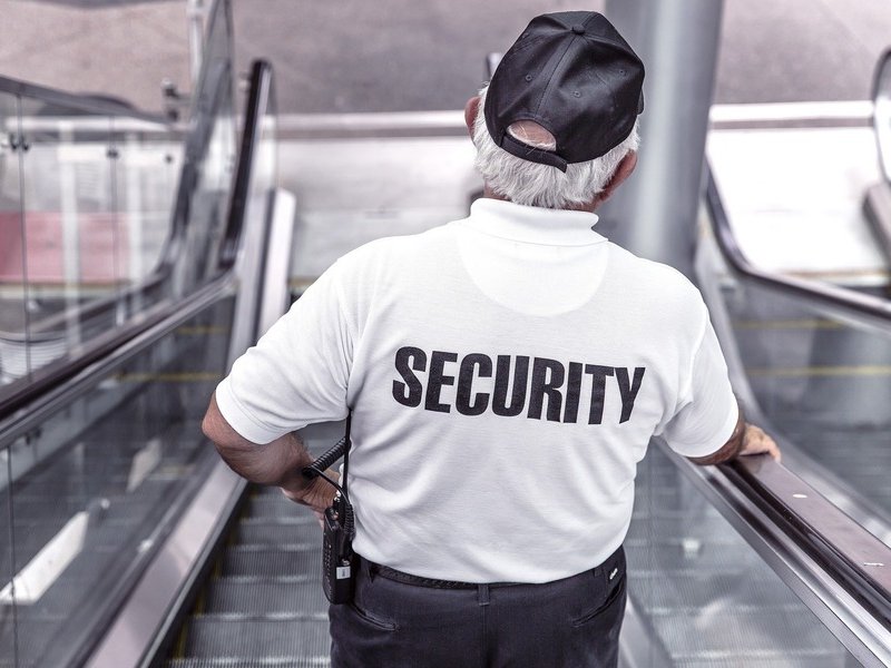 security guard on the escalator