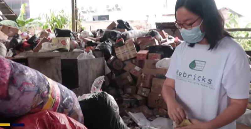 WATCH: An Indonesian woman is recycling waste plastic into construction bricks