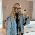 Sabrina Carpenter wearing a light blue jacket