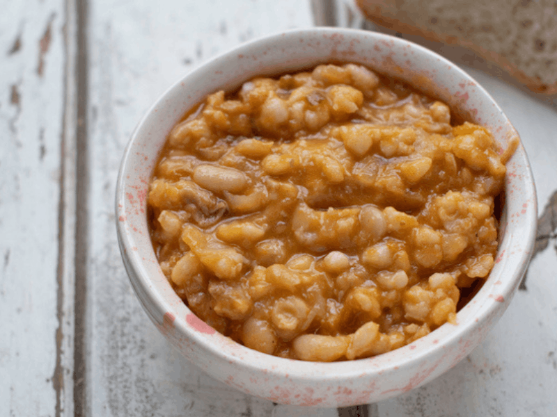 samp and beans in a white bowl