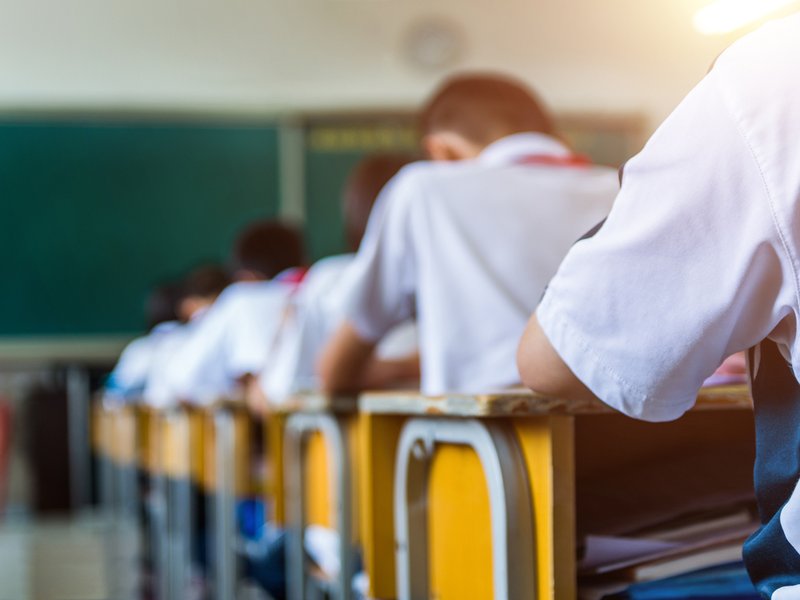 School students studying in classroom