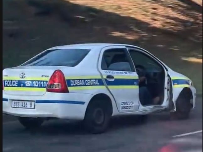 Screenshot of viral video doorless cop car Durban
