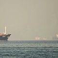 Cargo ships and tankers are seen in the Strait of Hormuz