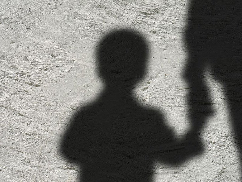 child abuse child silhouette
