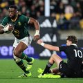 Springbok captain Siya Kolisi running with the ball against All Blacks