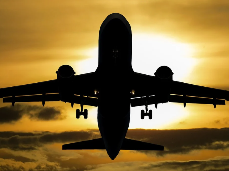 A man flies solo on a plane ride from Mumbai to Dubai