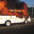 Taxi on fire near Clare Road bridge