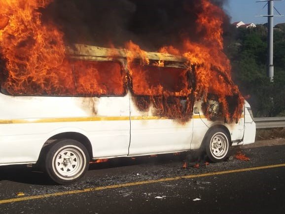 Taxi on fire near Clare Road bridge