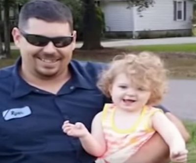 Toddler dies after being left in police car